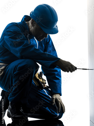 man construction worker screwdriving silhouette