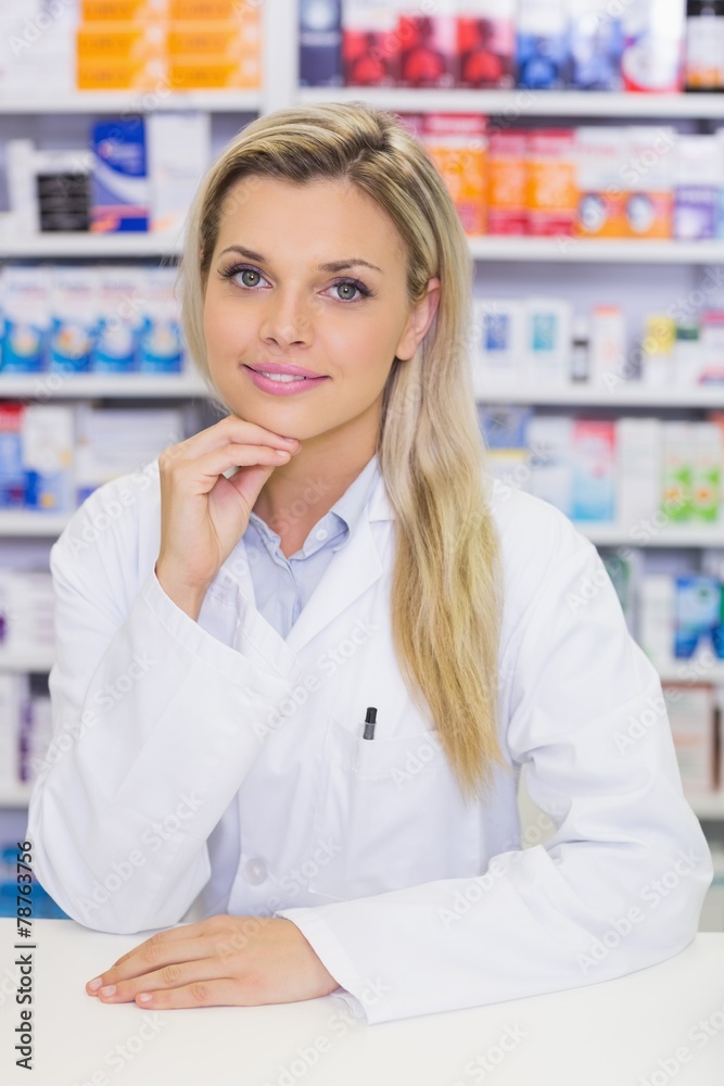 Portrait of a smiling pharmacist looking at camera Portrait of a smiling pharmacist looking at camera