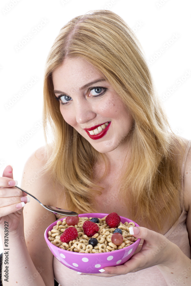 Model Released. Attractive Young Woman Eating Breakfast Cereal Model Released. Attractive Young Woman Eating Breakfast Cereal
