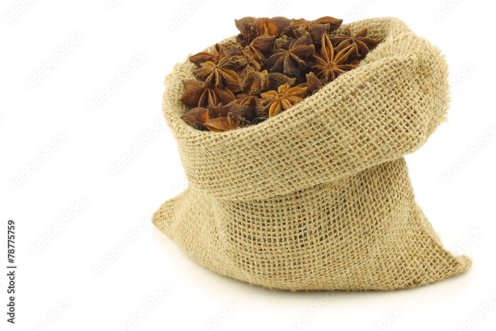 dried star anise  (Illicium verum) in a burlap bag 