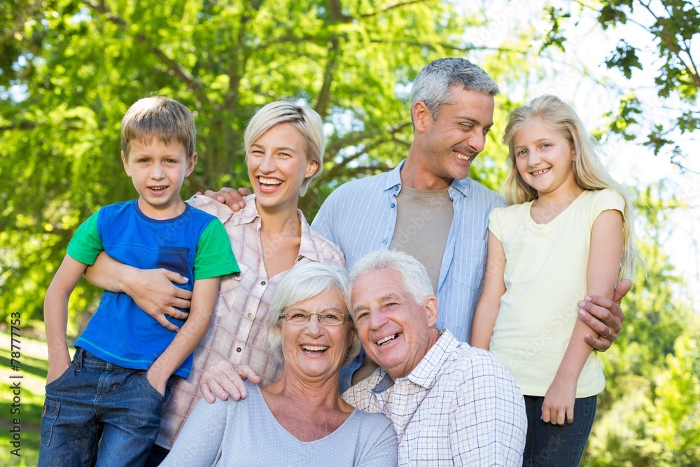Happy family smiling to the camera Happy family smiling to the camera