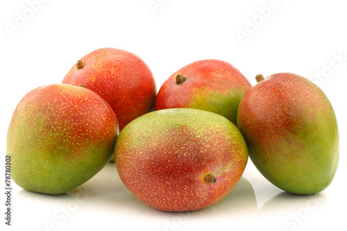fresh mango fruits on a white background