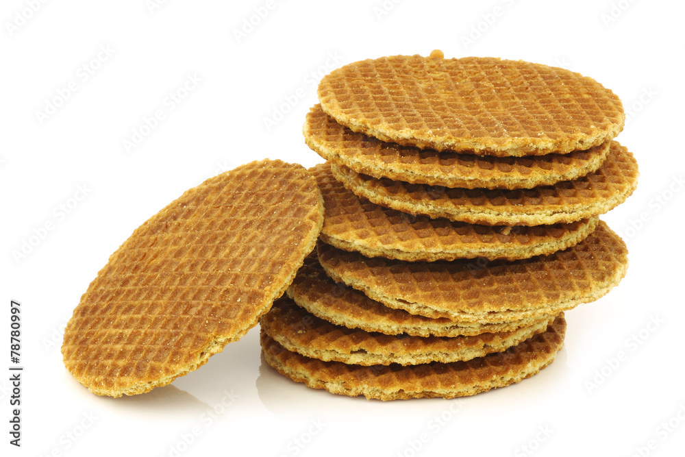Dutch waffle called a stroopwafel on a white background Dutch waffle called a stroopwafel on a white background