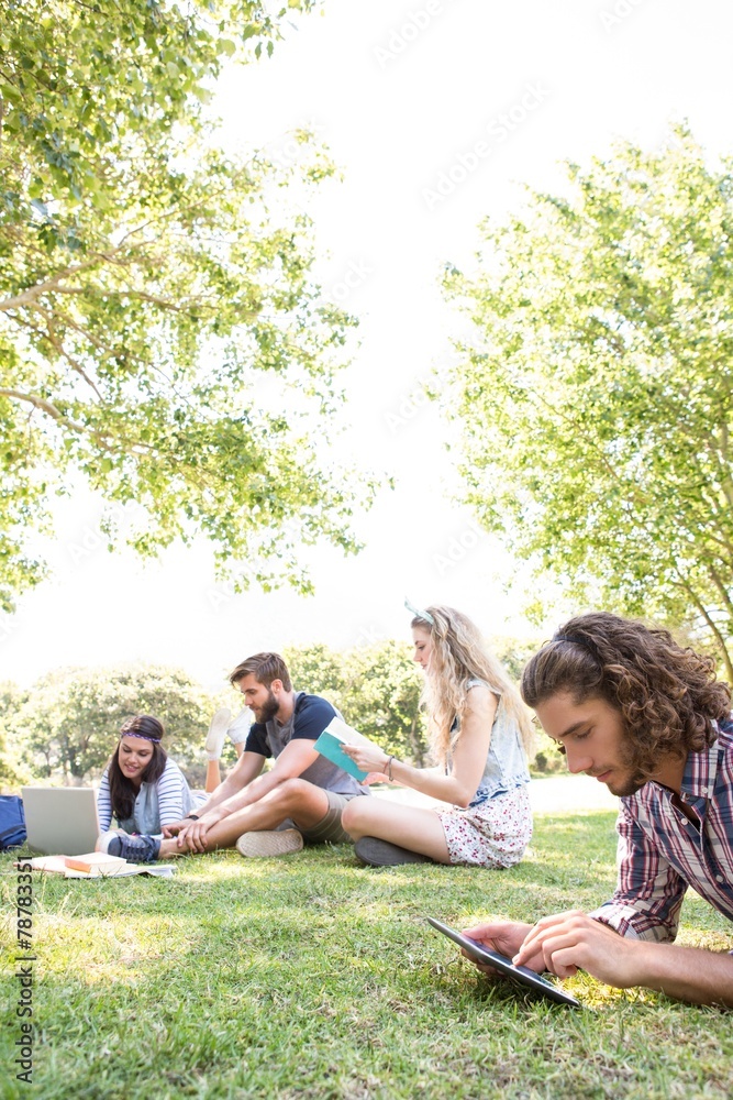 Classmates revising together on campus Classmates revising together on campus