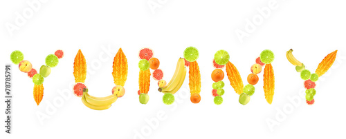 Word Yummy made of fruits isolated on white