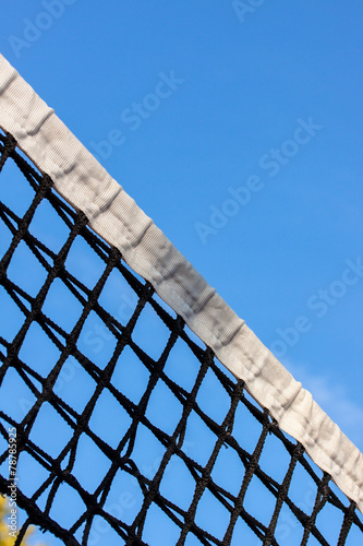 Tennis court net and sky