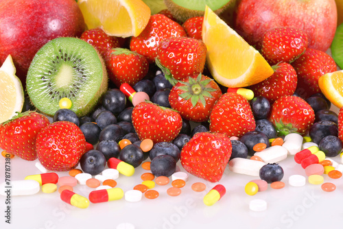 Fototapeta Naklejka Na Ścianę i Meble -  Berries, fruits, vitamins and nutritional supplements