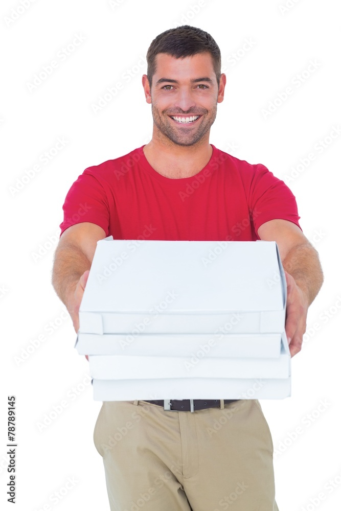 Happy delivery man giving pizza boxes Happy delivery man giving pizza boxes