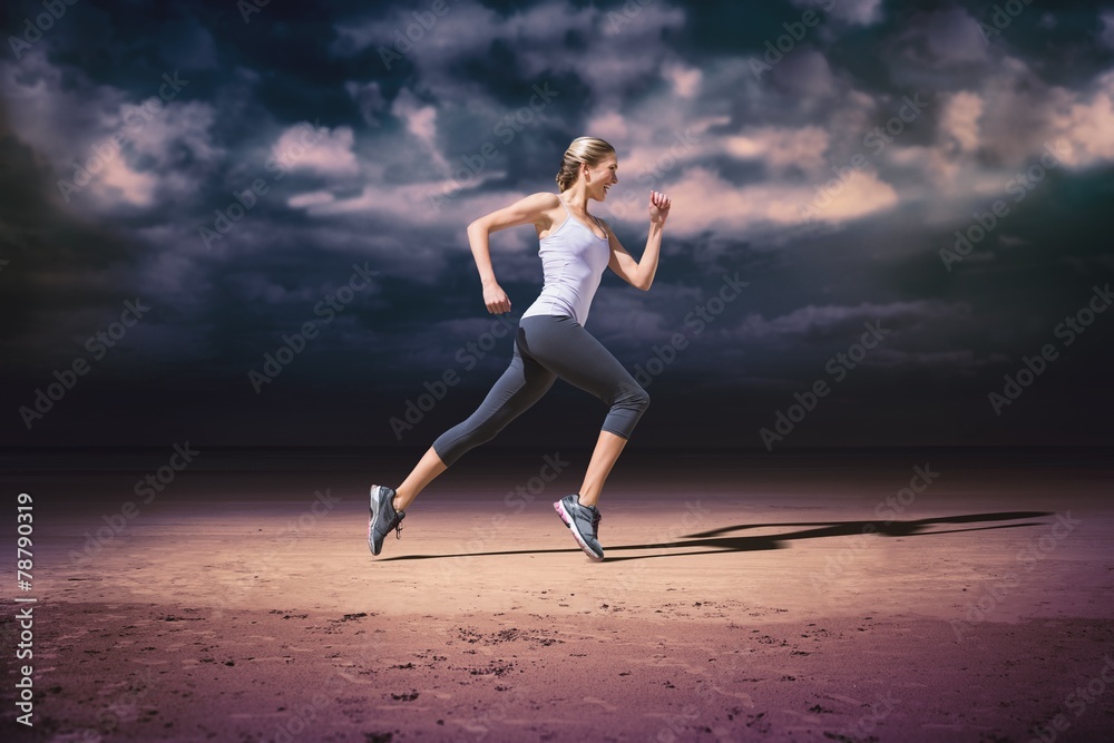 Composite image of pretty fit blonde jogging Composite image of pretty fit blonde jogging