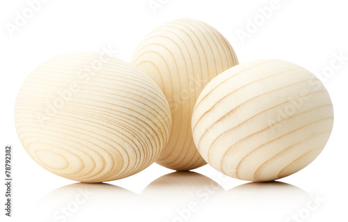 wooden eggs isolated on white background