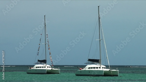 Catamarans anchored in a lagoon of the Indian ocean