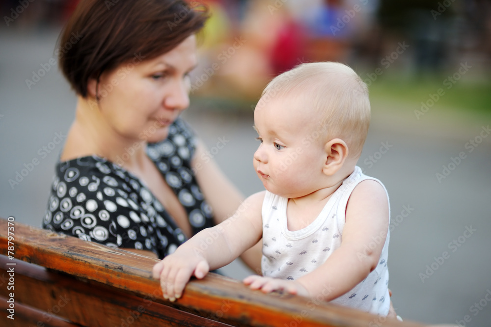 Beautiful middle aged woman and her adorable little grandson Beautiful middle aged woman and her adorable little grandson