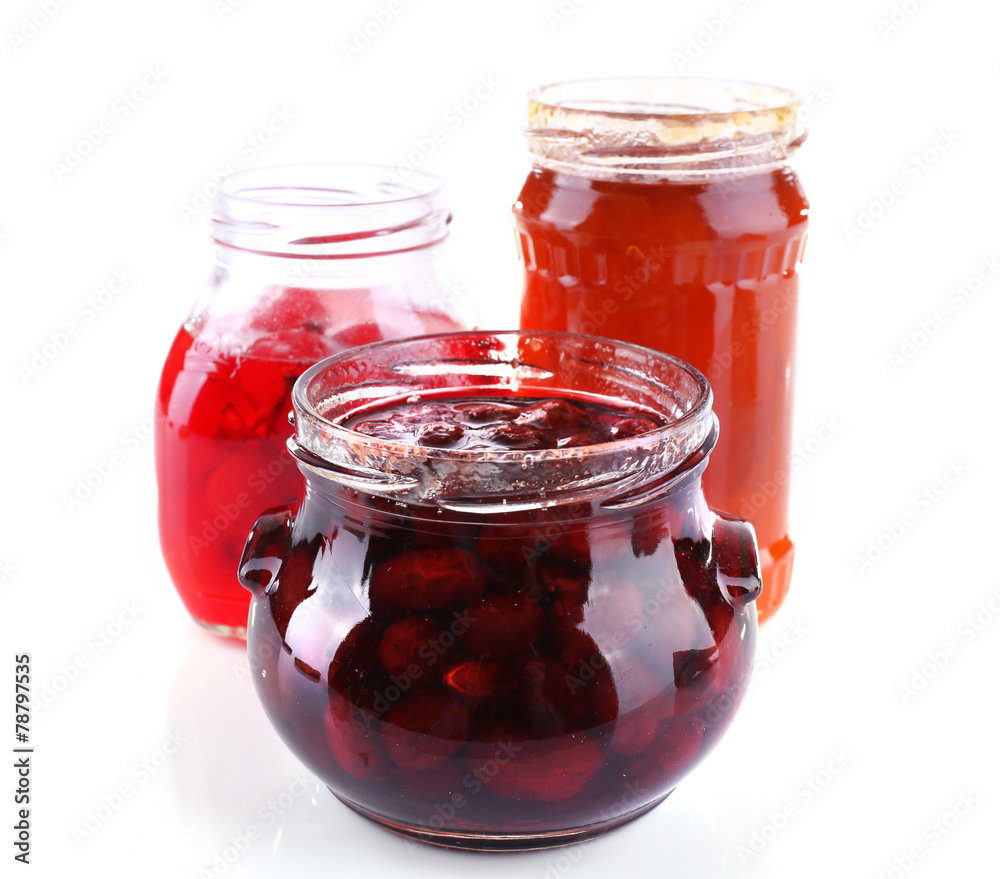 Homemade jars of fruits jam isolated on white background Homemade jars of fruits jam isolated on white background
