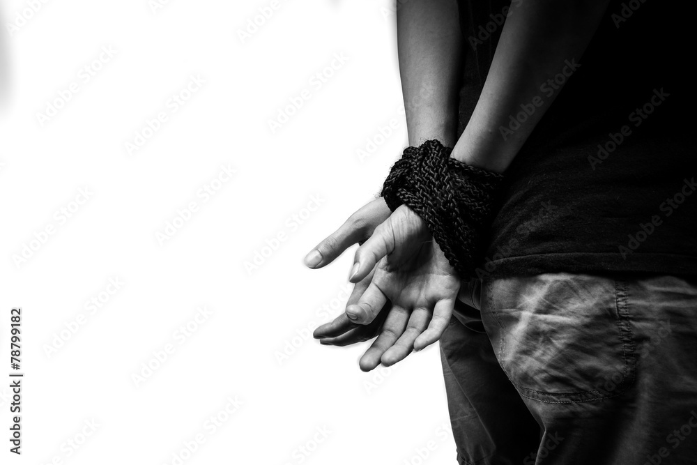 Hands of a missing kidnapped, abused, hostage, victim woman tied