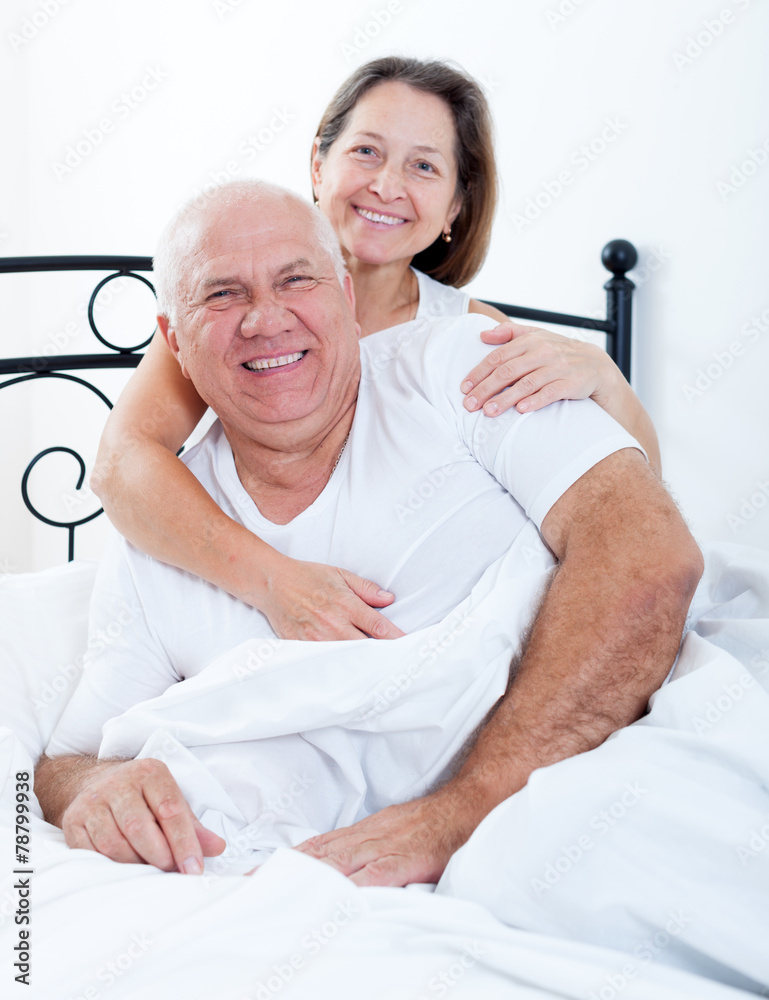 Obraz premium elderly couple in bed.