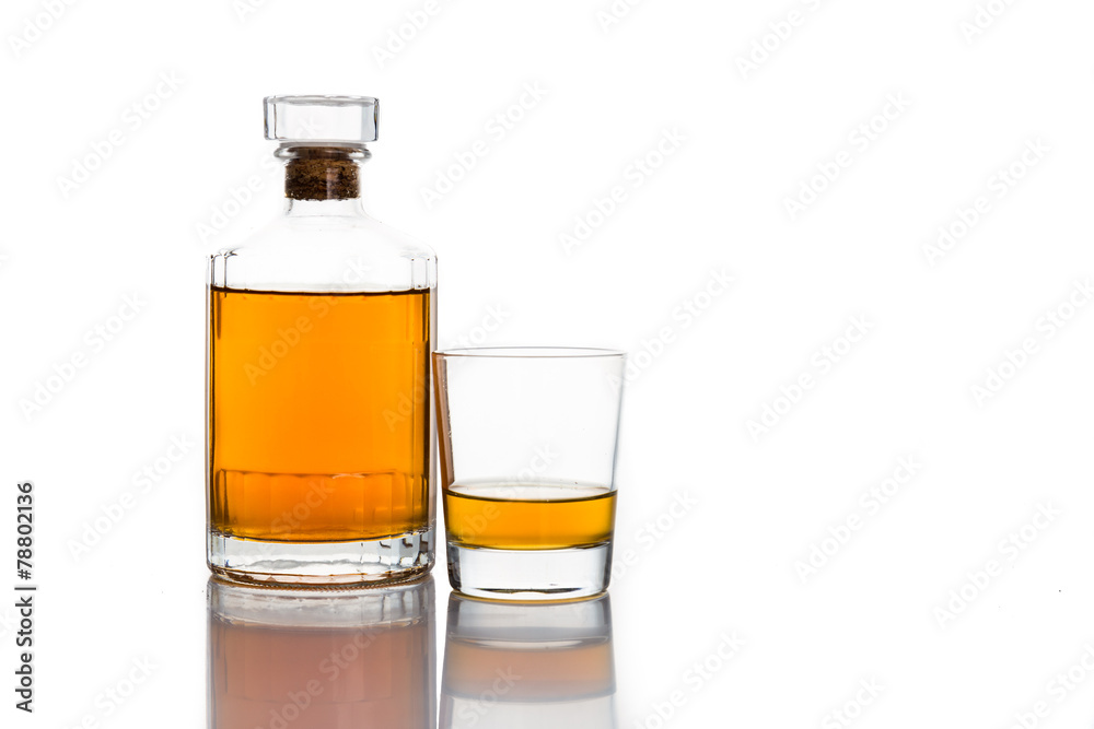 Whiskey on neat, with a whiskey bottle Whiskey on neat, with a whiskey bottle
