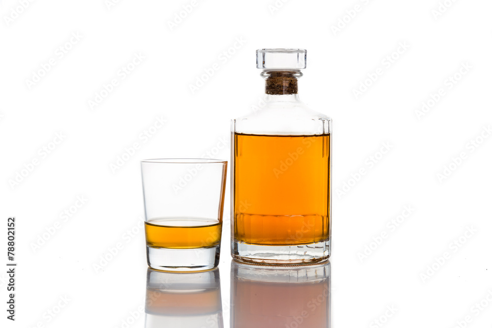 Whiskey on neat, with a whiskey bottle Whiskey on neat, with a whiskey bottle