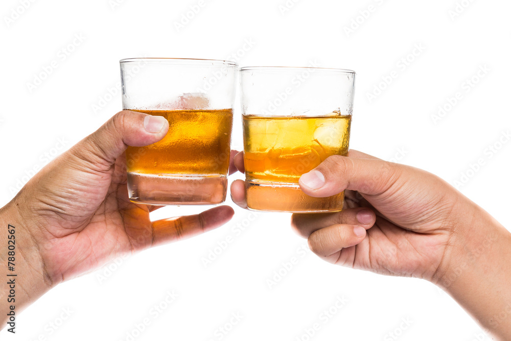 Two hands toasting whiskey on the rock with white background Two hands toasting whiskey on the rock with white background