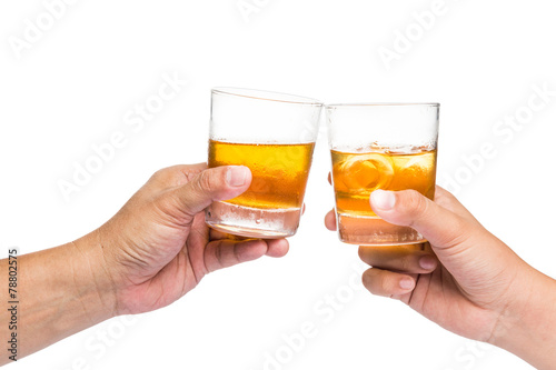 Two hands toasting whiskey on the rock with white background