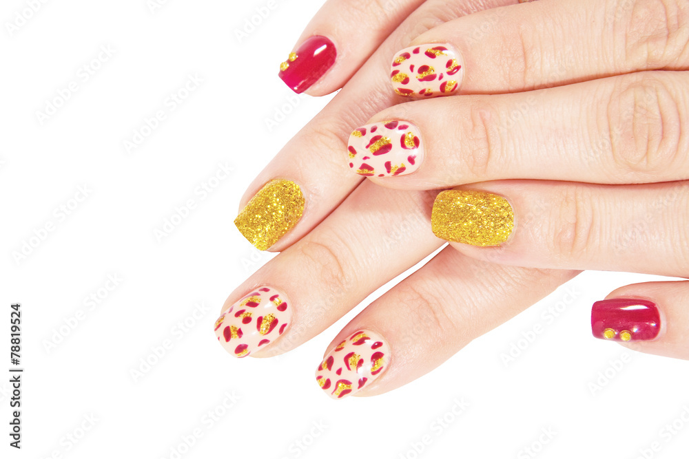 Woman shows beautiful multi-colored nail polish on fingers. Isolated on white background Woman shows beautiful multi-colored nail polish on fingers. Isolated on white background