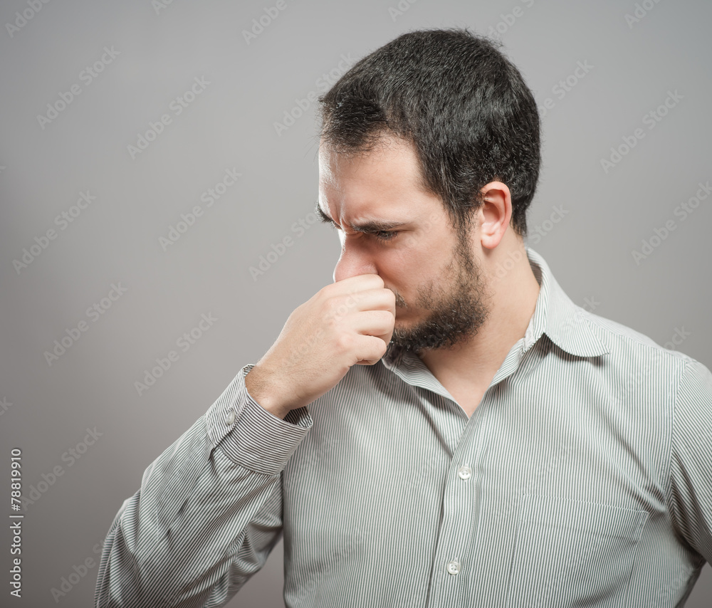 Mature man suffering from sinus pressure pain. Mature man suffering from sinus pressure pain.