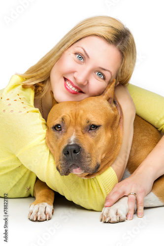 Woman hugging her dog