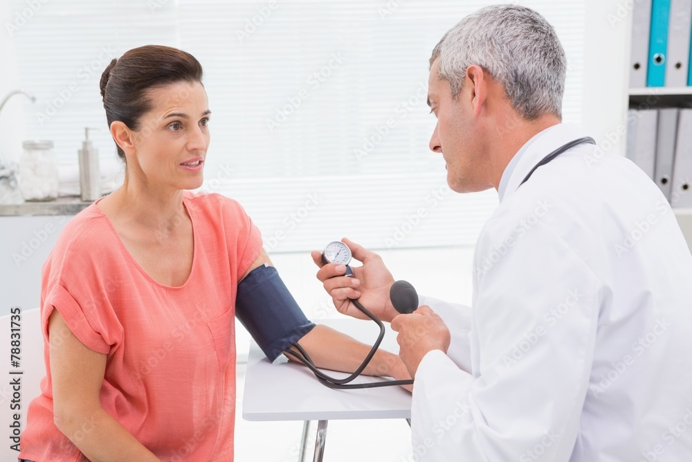 Doctor doing test at his patient Doctor doing test at his patient