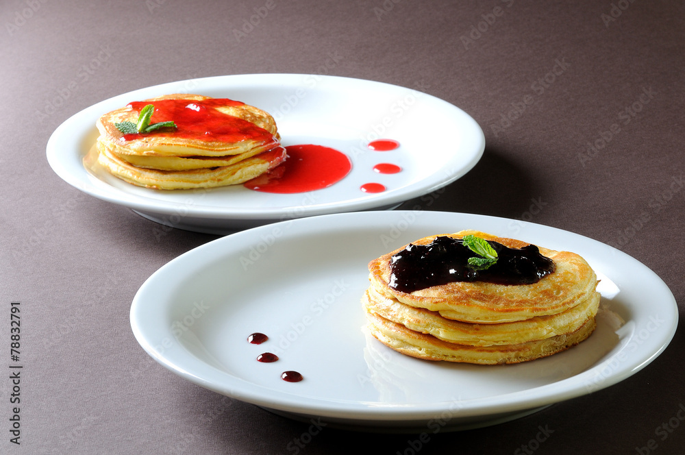 pancakes on a white plate pancakes on a white plate