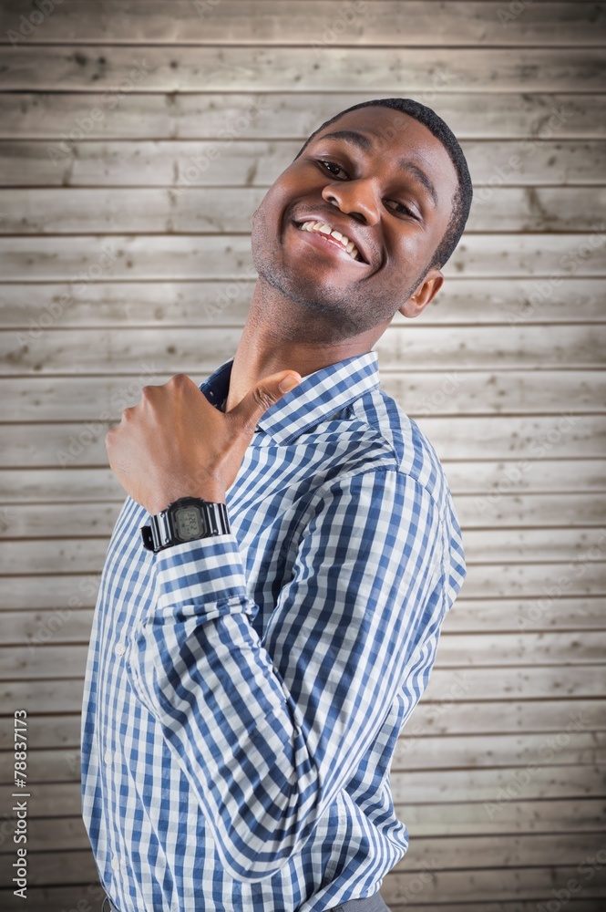 Composite image of happy businessman smiling at camera Composite image of happy businessman smiling at camera