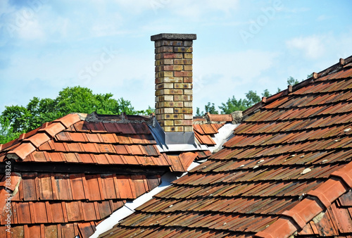 House roofs with smoke stack