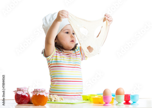 child girl playing with dou...
