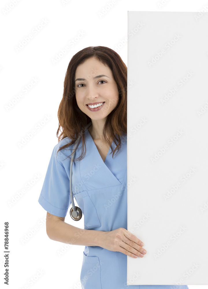 Friendly nurse or doctor with a blank advertisement board Friendly nurse or doctor with a blank advertisement board