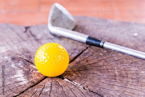 Still life Yellow Miniature Golf Ball On White Background.