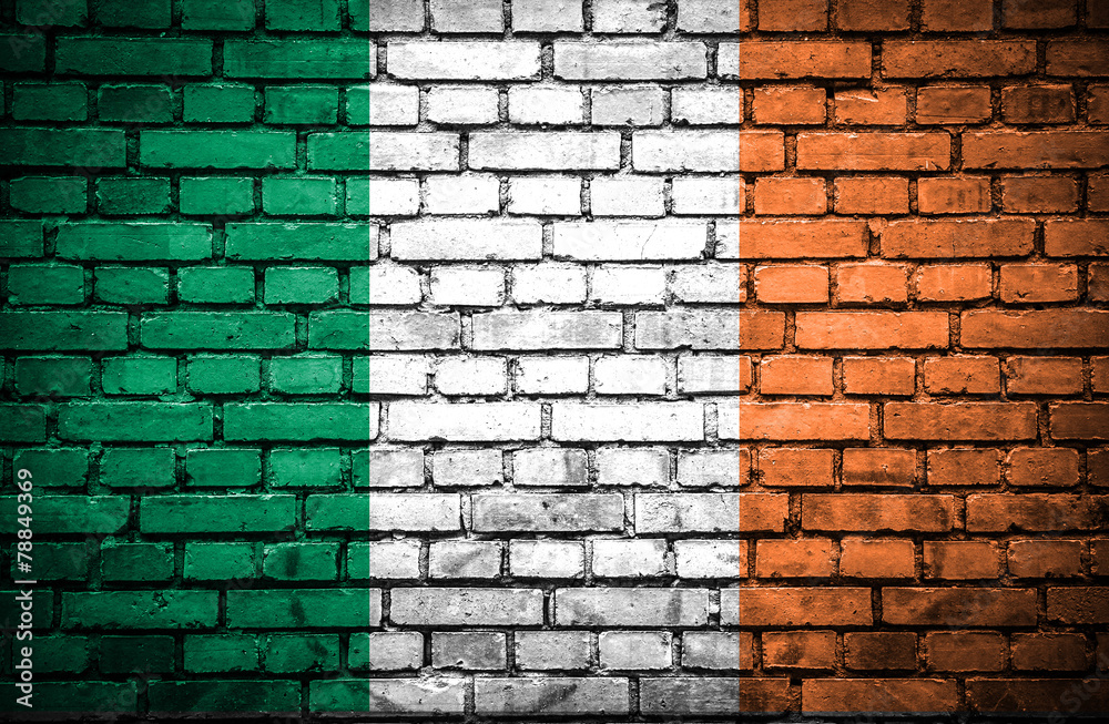 Brick wall with painted flag of Ireland Brick wall with painted flag of Ireland