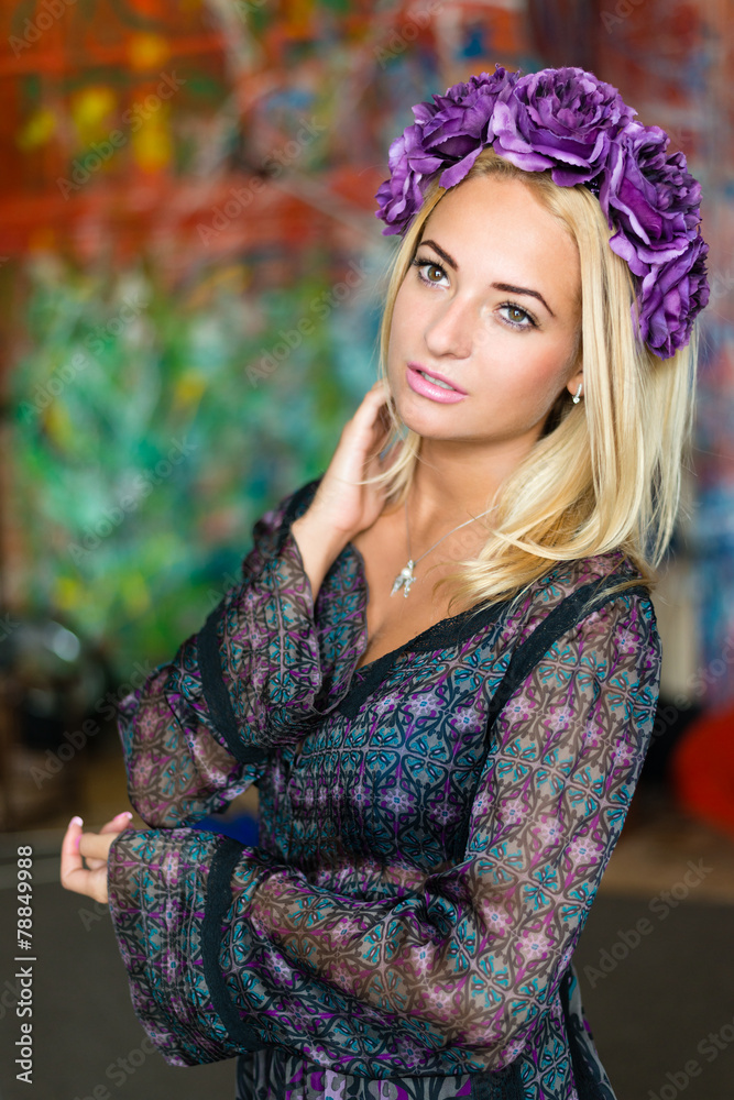 Beauty portrait of young pretty girl with flower wreath in her Beauty portrait of young pretty girl with flower wreath in her