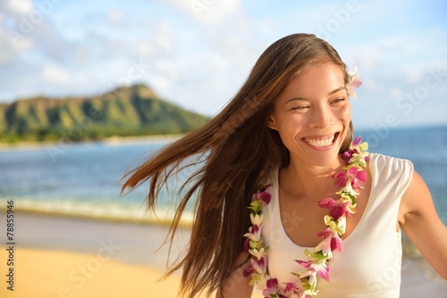 Hawaii beach woman happy on Hawaiian holidays photo