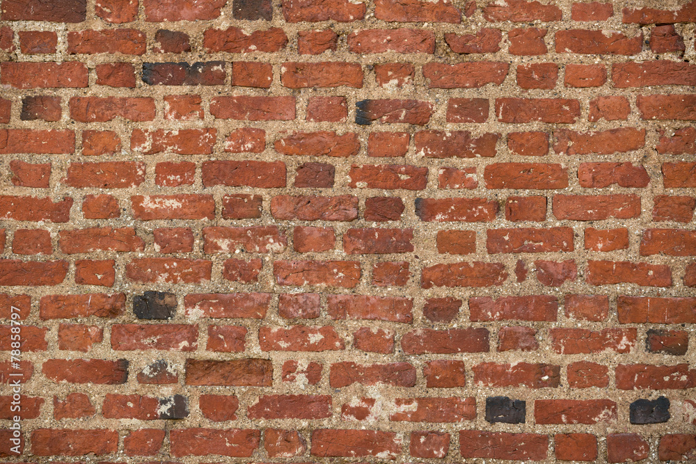 red brick wall of medieval castle