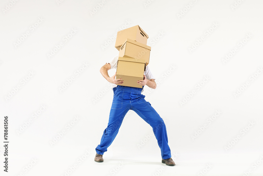 Hard-working builder with bunch of boxes
