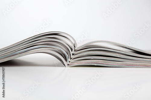 stack of magazines on the table