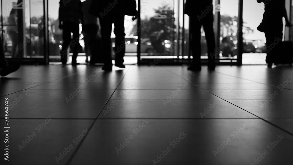 Accelerated black and white video:people are leaving the airport Accelerated black and white video:people are leaving the airport
