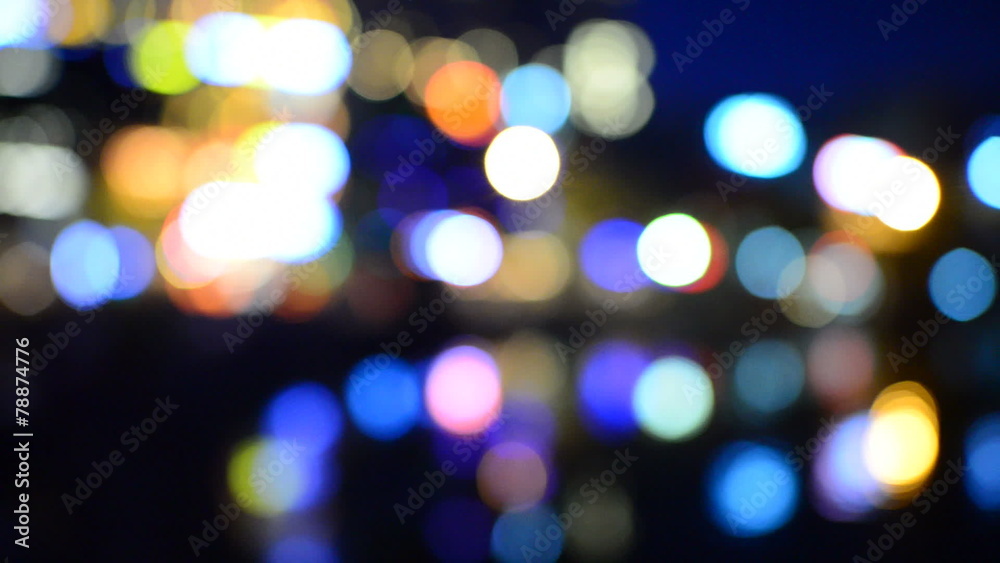 Blurred Colorful City Lights Reflecting off Water - Hanoi Vietnam Blurred Colorful City Lights Reflecting off Water - Hanoi Vietnam