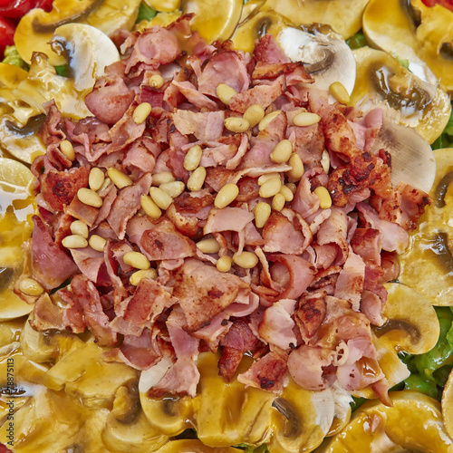 gourmet salad with spicy bacon and mushrooms