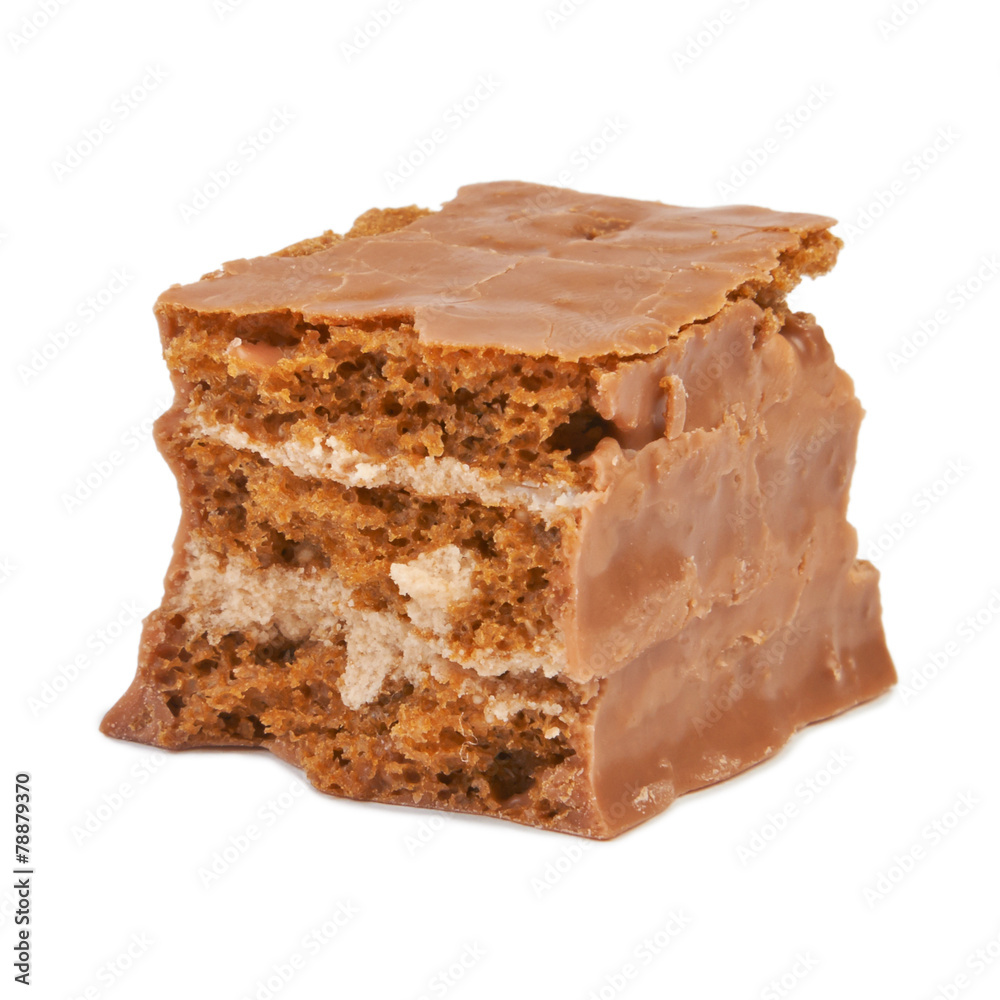 The broken pieces of chocolate biscuit isolated on white The broken pieces of chocolate biscuit isolated on white