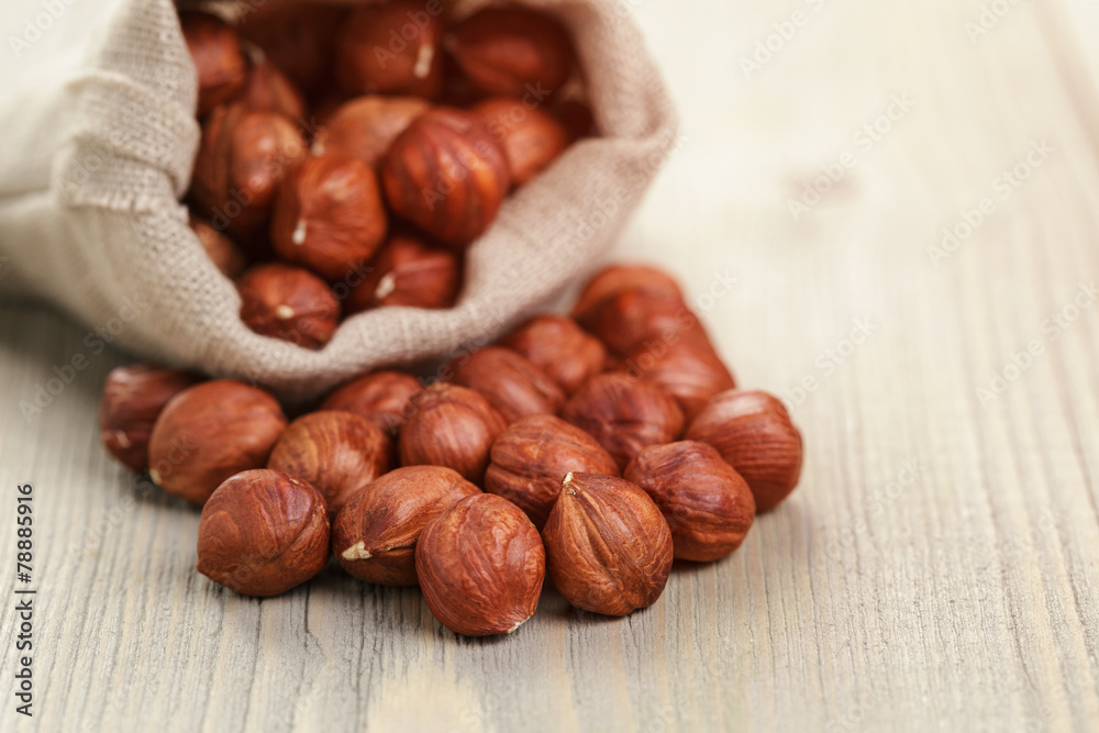 sack bag full of hazelnut kernels, rustic style photo sack bag full of hazelnut kernels, rustic style photo