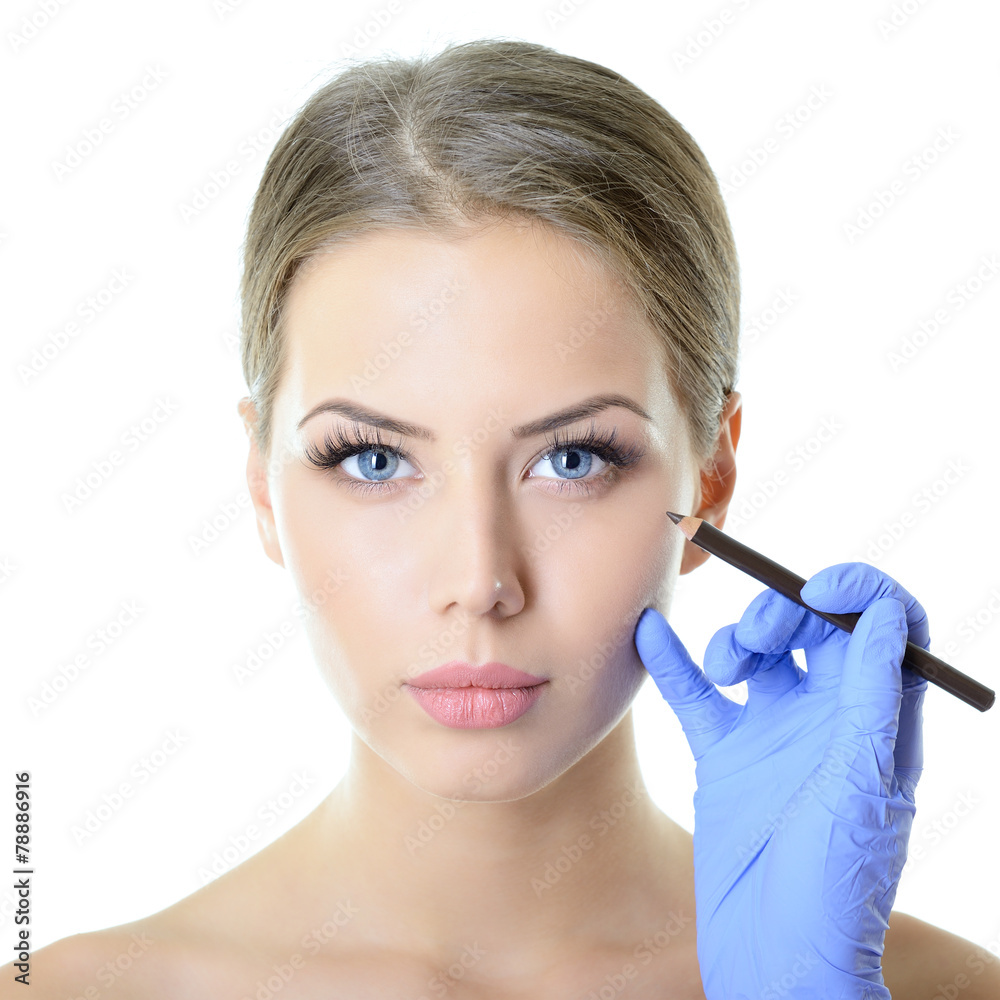Beautiful woman ready for cosmetic surgery, female face with doc