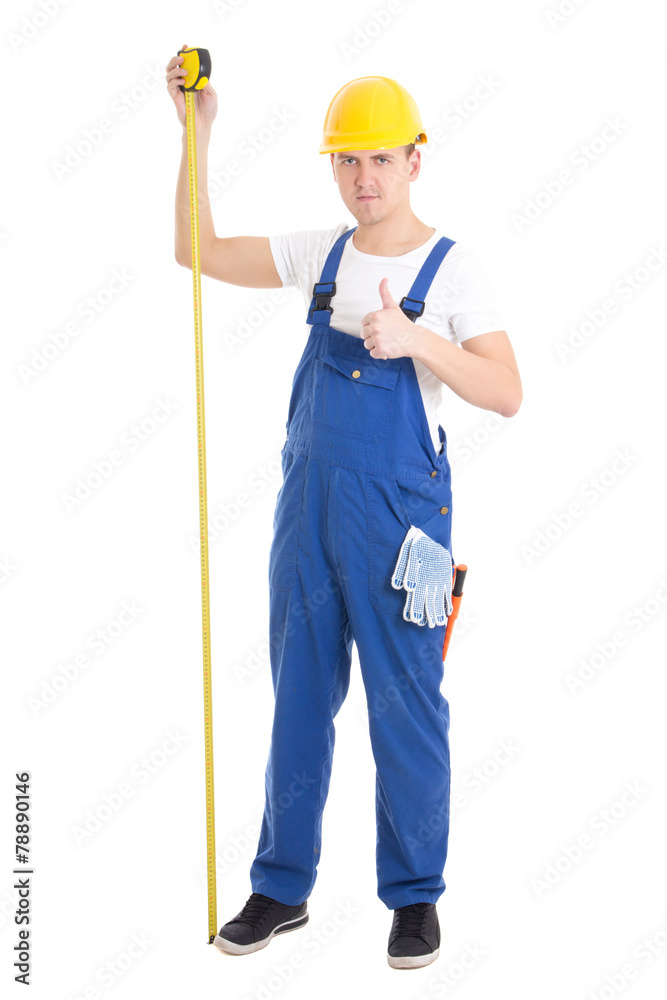 career concept - man builder in blue uniform holding measure tap