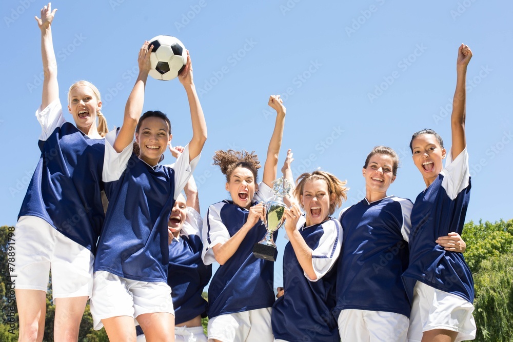 Pretty football players celebrating their win Pretty football players celebrating their win