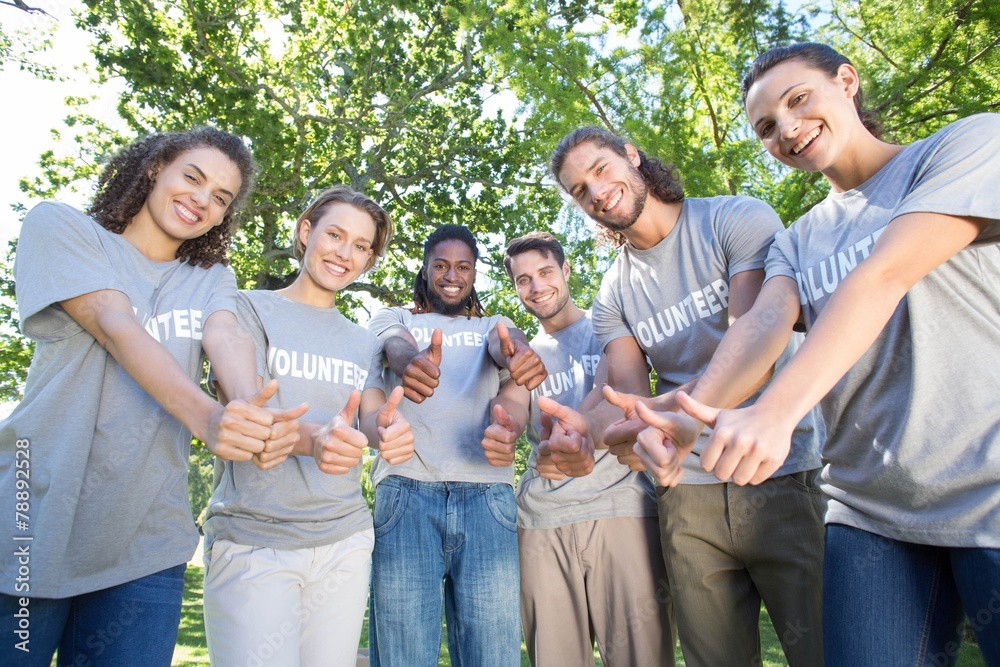 Obraz premium Happy volunteers in the park