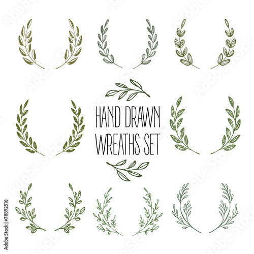 Set of hands drawn decorative wreaths. Vector illustration