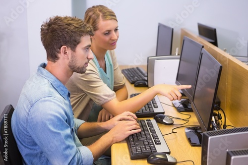 Students working on computer together